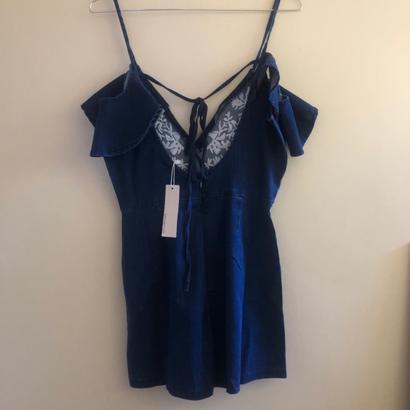 Denim romper with embroidery - Picture 2 of 3